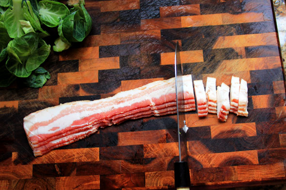 Slice 4 ounces of whatever bacon you have on hand into lardons, like this!