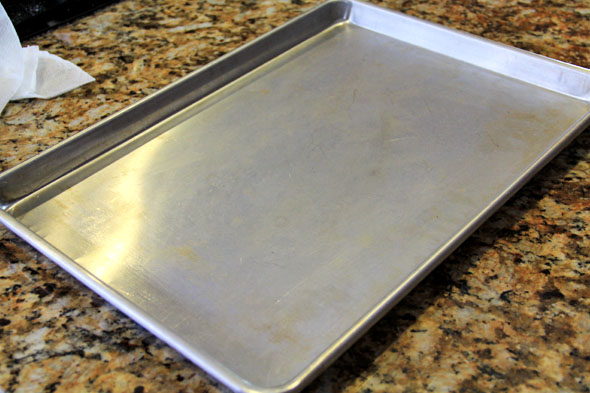To ensure even cooking and no burnt bottoms, please use an aluminum baking sheet. If you use a coated baking sheet, there's a chance the bottoms will burn because those pans get hotter than they should.