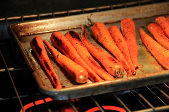 After about 10 min, turn the carrots over so they caramelize on the other side.
