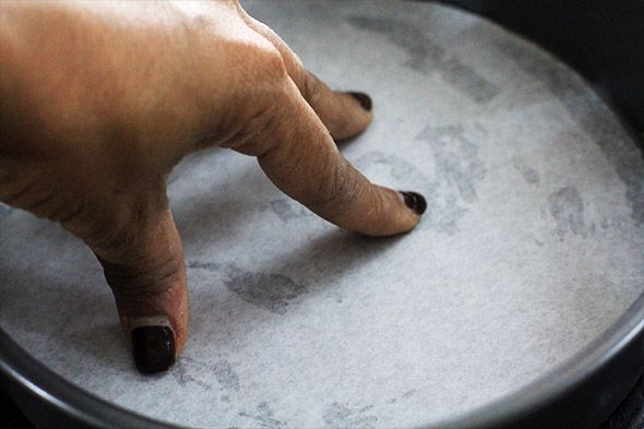 place the parchment on top of the non-stick spray.