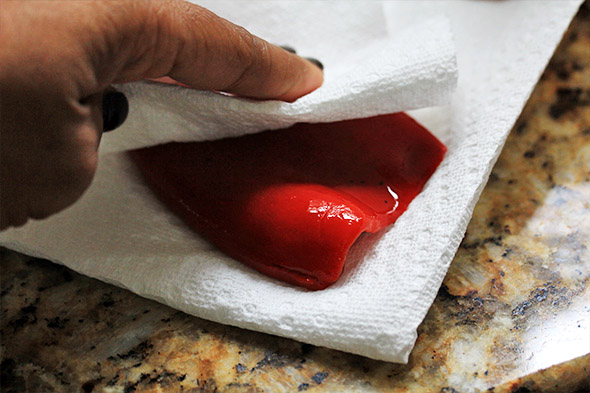 remove the excess moisture from your jarred roasted red pepper. we don't need that extra wetness. heh.