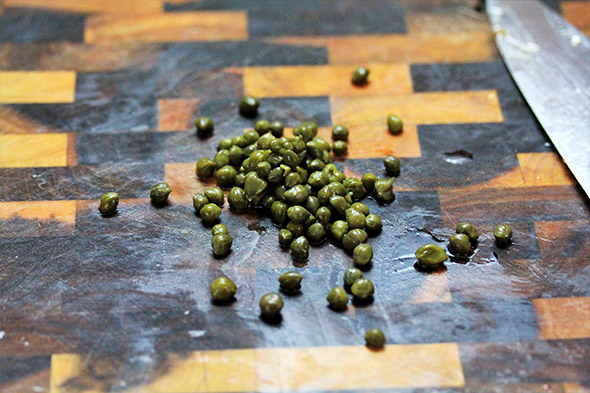 chop up about 1 tablespoon of capers.