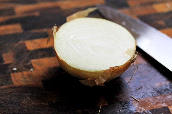 chop a large sweet onion in half, or use a small one. if using a large, wrap it up tightly with plastic and save for another use.