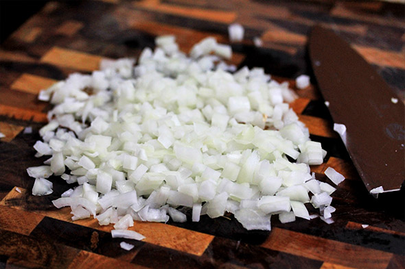 chop the onion like so, a small dice.