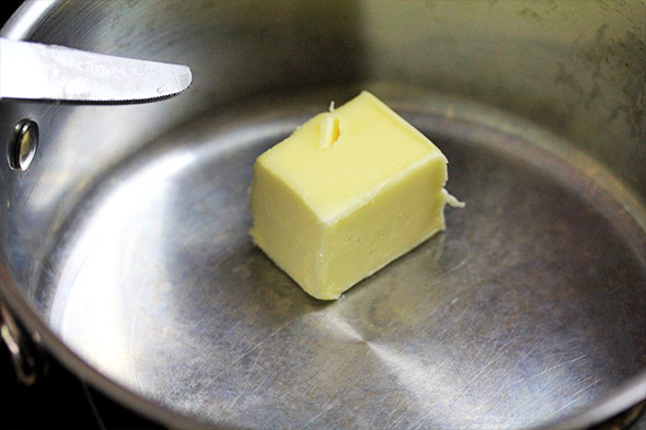 melt about 3 tablespoons of unsalted butter in a medium saucepan over medium heat.