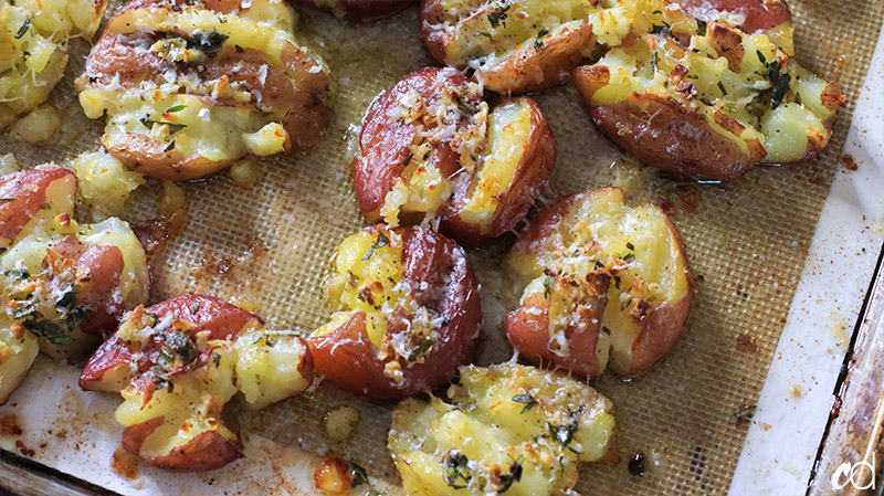 Crispy Smashed Garlic and Herb Duck Fat Potatoes