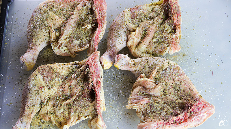 herbs de provence on chicken leg quarters