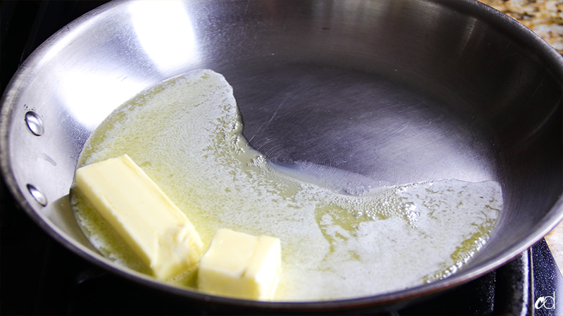 butter melting in pan