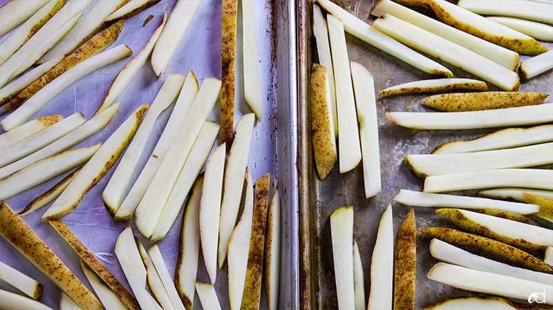 potato fries on baking sheet unseasoned