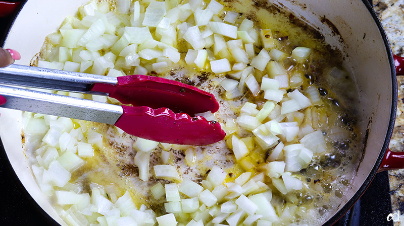 adding onions to hot butter