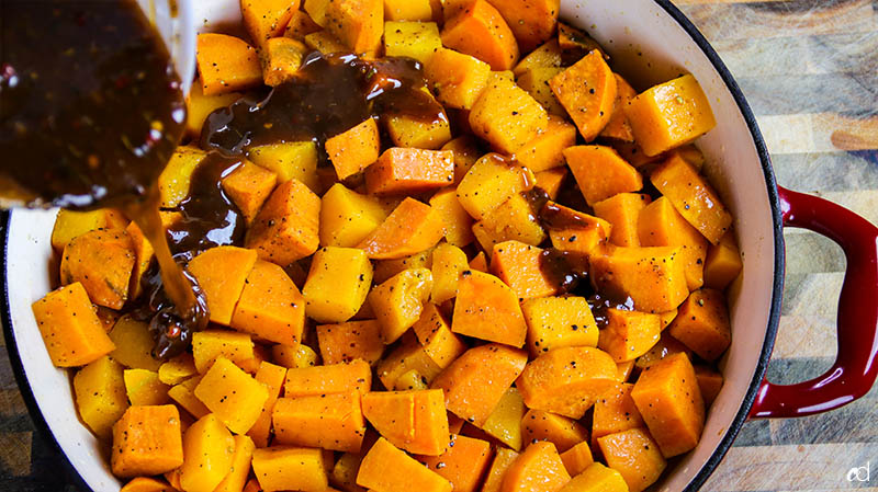 adding savory caramel to sweet potatoes and butternut squash