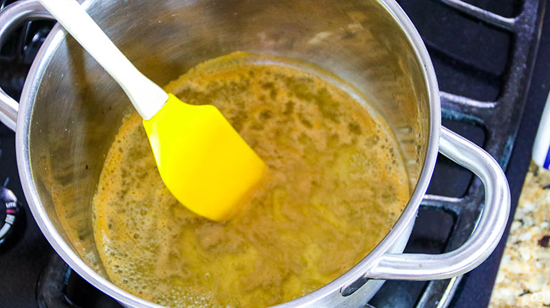 stirring boiling apple cider