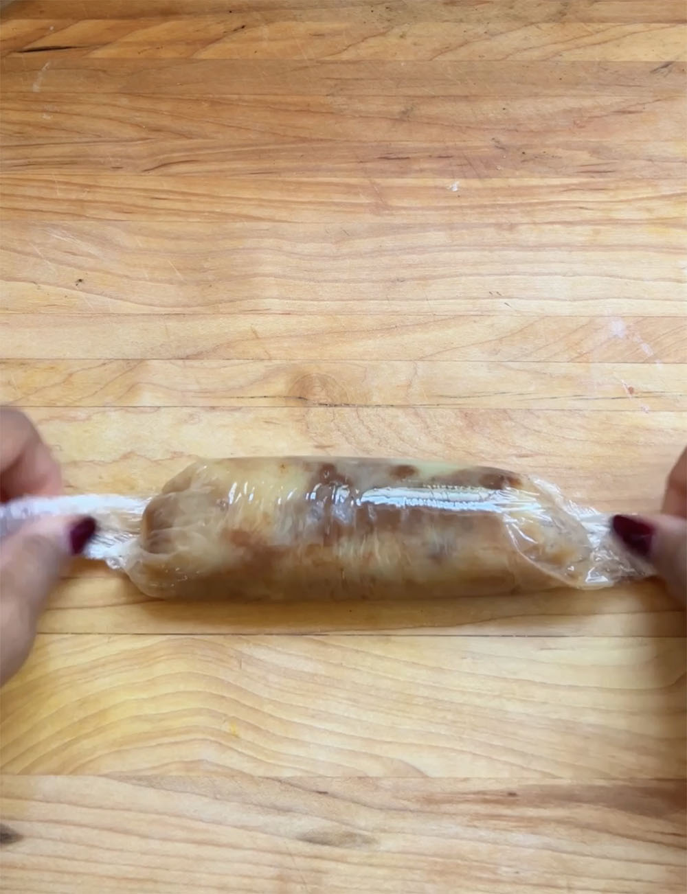 rolling brown butter into a log