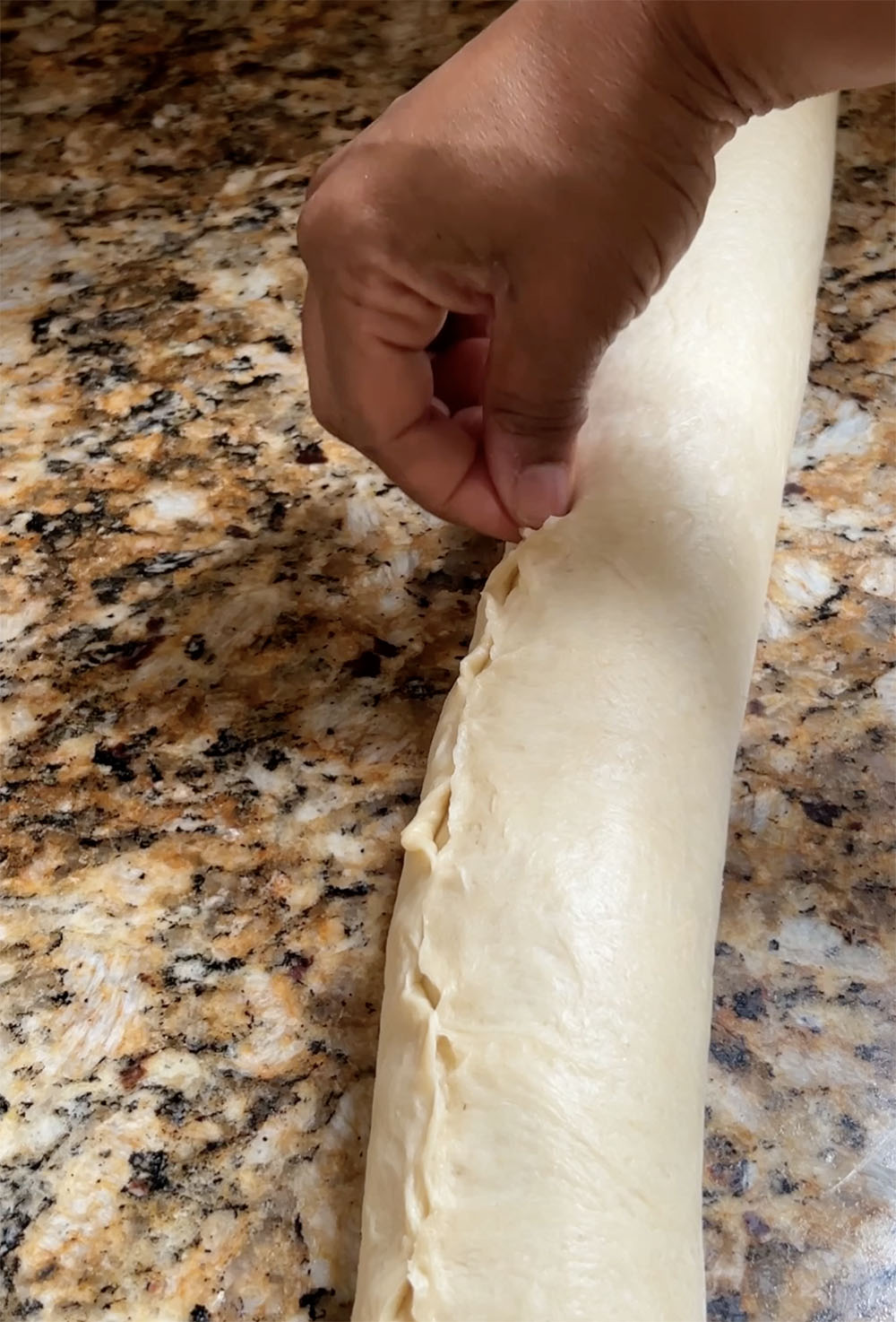 pinching the dough closed